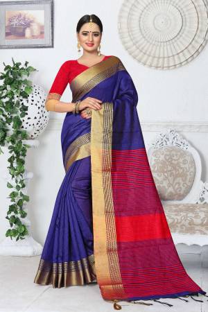Bright And Visually Appealing Color Is Here With This Saree In Violet Color Paired With Contrasting Red Colored Blouse. This Saree And Blouse Are Fabricated On Kanjivaram Art Silk. Buy This Saree Now.