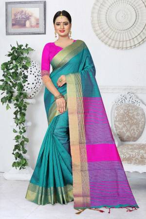 Here Is A Pretty Saree In Two Tone Shades Of Turquoise Blue Paired With Contrasting Powder Pink Colored Blouse. This Saree And Blouse Are Fabricated On Kanjivaram Art Silk Beautified With Weave. Buy Now.