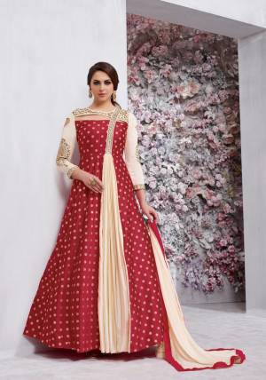 Grab This Beautiful Designer Radymade Suit In Maroon And Cream Colored Top Paired With Cream Colored Bottom And Dupatta. Its Top Is Fabricated On Art Silk Paired With Santoon Bottom And Chiffon Dupatta. Its Top Is Fully Stitched With Extra Margin And Unstitched Bottom. Buy This Suit Now.