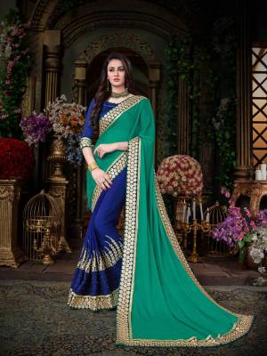 Cool Combination Is Here With This Designer In Sea Green And Royal Blue Color Paired With Royal Blue Colored Blouse. This Saree Is Fabricated On Georgette Paired With Art Silk Fabricated Blouse. It Has Attractive Embroidered Lace Border. Buy Now.