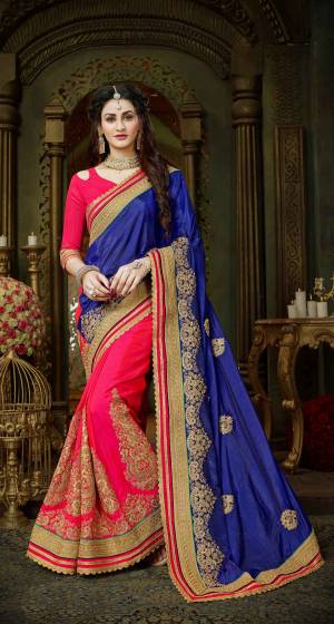 Shine Bright Wearing This Attractive Colored Saree In Royal Blue And Fuschia Pink Color Paired With Fuschia Pink Colored Blouse. This Saree And Blouse Are Fabricated On Art Silk Beautified With Heavy Jari Embroidery.