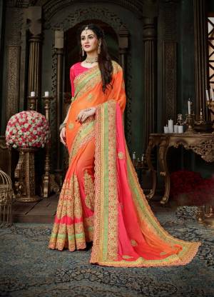 Look Pretty Wearing this Beautiful Designer Saree In Orange Color Paired With Pink Colored Blouse. This Saree Is Fabricated On Chiffon Paired With Art Silk Fabricated Blouse. It Has Heavy Jari Embroidery All Over The Saree And Also This Saree Will Earn You Lots Of Compliments From Onlookers.