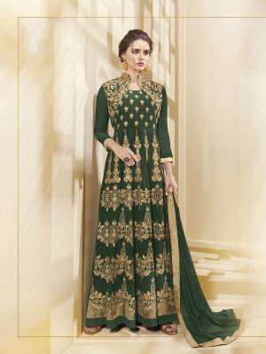 Elegant And Designer Floor Length Suit Is Here In Pine Green Color Paired With Pine Green Colored Bottom And Dupatta. Its Top Is Fabricated On Georgette Paired With Santoon Bottom And Chiffon Dupatta. This Suit Is Beautified With Heavy Embroidery All Over It, Buy It Now.
