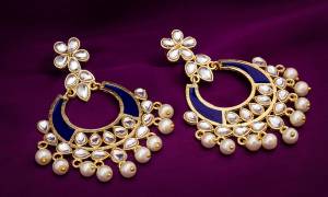 Here Is Another Attractive Pair Of Earrings In Golden and Blue Color Beautified With Stone And Moti Work. This Lovely Earrings Set Is Light In Weight And Easy To Carry Throughout The Gala.