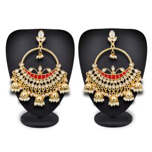 Grab This Beautiful Traditonal Heavy Earrings In Golden and Red Color Beautified With Stone And Moti Work. These Pair Of Beautiful Earrings Can Be Paired With Orange Or Any Contrasting Colored Ethnic Attire.