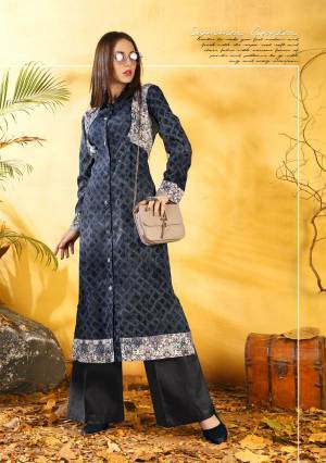Grab This Simple And Elegant Kurti For Your Regular Wear In Dark Grey Color Fabricated On Rayon Cotton Beautified With Prints.  This Readymade Kurti Is Available In Sizes. Buy Now.