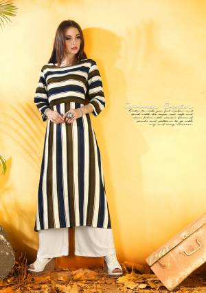 Lovely Stripes Printed Readymade Kurti Is Here In Multi Color Fabricated On Rayon. This Kurti Has Very Pretty Stripe Prints All Over It. This Kurti Is Without Jacket.  Also It Is Comfortable To Carry All Day Long.