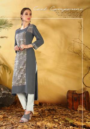 A Must Have Casual Kurti In Every Womens Wardrobe Is Here With This Grey Colored Readymade Kurti. This Kurti IS Fabricated On Rayon Beautified With Prints. Buy It Now.