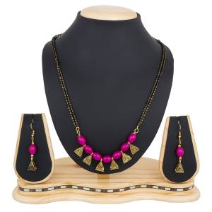 Grab This Beautiful Heavy Mangalsutra Set In Different Colors. This Pretty Mangalsutra Is Beautified With Dark Pink Colored Beads. This Mangalsutra Can Be Paired With Your Ethnic Wear. Buy It Soon Before The Stock Ends.