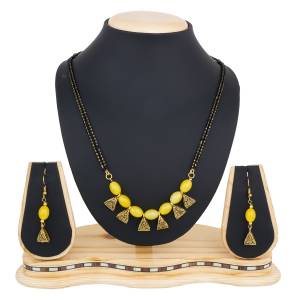 Grab This Beautiful Heavy Mangalsutra Set In Different Colors. This Pretty Mangalsutra Is Beautified With Yellow Colored Beads. This Mangalsutra Can Be Paired With Your Ethnic Wear. Buy It Soon Before The Stock Ends.