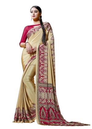 Grab This Pretty Elegant Looking Saree In Cream Color Paired With Dark Pink Colored Blouse. This Saree And Blouse are Fabricated On Crepe Beautified With Prints All Over.