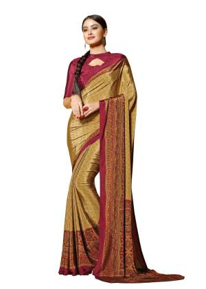 For Your Office Wear Or Formal Get Togather, Grab This Printed Saree In Beige Color Paired With Magenta Colored Blouse. This Saree And Blouse are Fabricated On Crepe Beautified With Prints All Over It. Buy This Saree Now.
