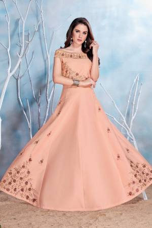 Get Ready For The Next Party At Your Place With This Designer Readymade Gown In Light Peach Color Fabricated On Modal Satin. This Pretty Gown Is Light Weight And Comfortable To Carry All Day Long. Buy Now.