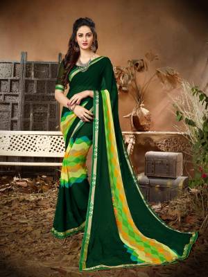 Attract All Wearing This Saree In Pine Green Color Paired With Pine Green Colored Blouse. This Saree And Blouse Are Fabricated On Georgette Beautified With Simple Multi Colored prints. It Is Light In Weight And Easy To Carry All Day Long.