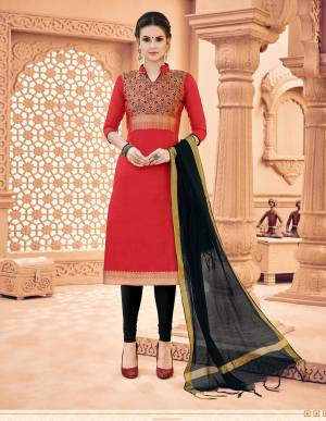 Grab This Dress Material For Your Regular Wear And Get This Stitched As Per Your Desired Fit And Comfort. Its Top Is In Red Color Paired With Black Colored Bottom And Dupatta. Its Top Is Fabricated On Banarasi Art Silk Paired With Cotton Bottom And Khadi Silk Dupatta. 