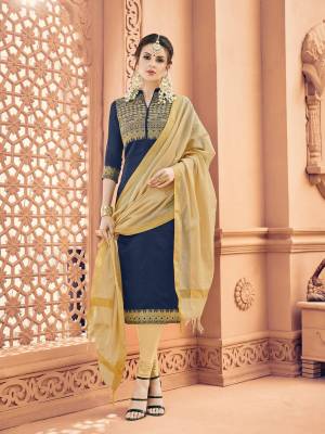 Enhance Your Personality, Wearing This Designer Straight Suit In Navy Blue Color Paired With Beige Colored Bottom And Dupatta. Its Top Is Fabricated On Banarasi Art Silk Paired With Cotton Bottom And Khadi Silk Dupatta. Get This Dress Material Stitched As Per Your Desired Fit And Comfort.