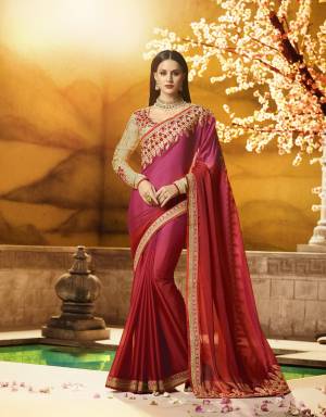 Adorn The Lovely Angelic Look Wearing This Designer Saree In Pink And Red Color Paired With Beige Colored Blouse. Pretty saree Is Fabricated On Silk Georgette Paired With Art Silk And Georgette Fabricated Blouse. It Has Heavy Embroidery Over The Saree Lace Border And Blouse. Buy Now.