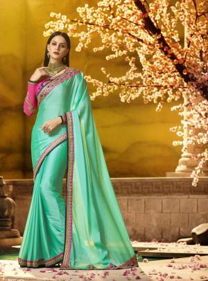 Here Is Another Attractive Saree Color Is Aqua Blue Color Paired With Contrasting Pink Colored Blouse. This Saree Is Fabricated On Silk Georgette Paired With Art Silk And Georgette Fabricated Blouse. Its Bright Colors And Heavy Embroidery Will Give An Attractive Look Like Never Before.