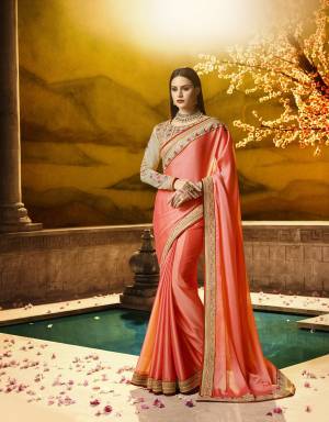 A Must Have Shade In Every Womens Wardrobe Is Here In Dark Peach Color Paired With Cream Colored Blouse. This Saree Is Fabricated On Silk Georgette Paired With Art Silk And Georgette Fabricated Blouse. Its Blouse And Saree Border Has Heavy Attractive Embroidery. 