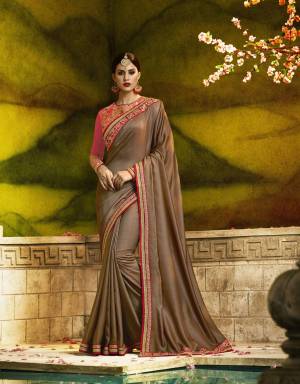 New And Unique Shade Is Here With This Designer Saree In Light Brown Color Paired With Contrasting Pink Colored Blouse. This Saree Is Fabricated On Silk Georgette Paired With Art Silk And Georgette Fabricated Blouse. Buy This Saree Now.
