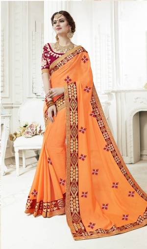 Look Pretty Wearing this Saree In Light Orange Color Paired With Contrasting Magenta Pink Colored Blouse. This Saree Is Fabricated On Georgette Paired With Art Silk Fabricated Blouse. Buy This Pretty Saree Now.
