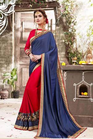 Celebrate This Festive Season with Beauty And Comfort Wearing This Saree In Blue And Red Color Paired With Red Colored Blouse. This Pretty Saree Is Fabricated On Satin And Georgette Paired With Art Silk Fabrciated Blouse. This saree Is Light Weight And Easy To Carry All Day Long.