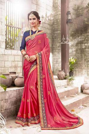 Look Pretty In This Lovely Pink Colored Saree Paired With Contrasting Blue Colored Blouse. This Saree Is Fabricated On Georgette Paired With Art Silk Fabricated Blouse. Buy This Designer Saree Now.