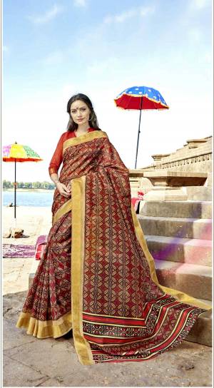 Go Colorful With This Beautiful Saree In Multi Color Paired With Orange Colored Blouse. This Saree And Blouse Are Fabricated On Cotton Silk Beautified With Prints All Over It, Buy This Saree Now.