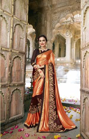 Shine Bright Wearing This Saree In Orange And Brown Color Paired With Brown Colored Blouse. This Saree Is Fabricated On Lycra And Georgette paired With Art Silk Fabricated Blouse. It Is Beautified With Heavy Embroidered Lace. 