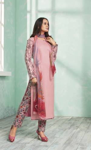 Look Pretty Wearing This Designer Straight Suit In Light Pink Color Paired With Multi Colored Dupatta. Its Top And Bottom Are Fabricated On Cotton Paired With Chiffon Dupatta. It Has Attractive Embroidered Sleevs With Prints All Over.