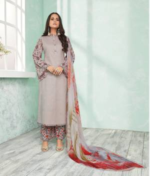 Flaunt Your Rich And Elegant Taste With This Pretty Color, Grab This Suit In Grey Colored Top Paired With Grey Colored Bottom And Dupatta. Its Top and Bottom Are Fabricated On Cotton Paired With Chiffon Dupatta. Buy This Suit Now.