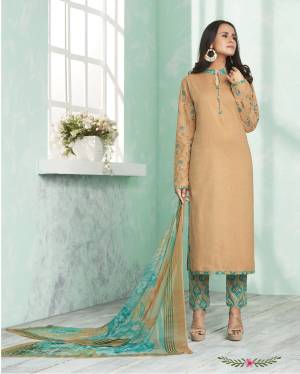 Simple And Elegant Looking Suit Is Here For Your Semi-Casual Wear In Beige Colored Top Paired With Blue And Beige Colored Bottom And Dupatta. Its Top And Bottom Are Fabricated On Cotton Paired With Chiffon Dupatta. It Is Beautified With Prints And Thread Work Over The Sleeves.