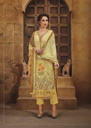 Grab This Pretty Semi-Stitched Suit In Light Yellow Color Paired With Light Yellow Colored Bottom And Dupatta. Its Top And Bottom Are Fabricated On Satin Paired With Chiffon Dupatta. It Is Soft Towards Skin And Easy To Carry All Day long.