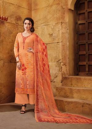 Orange Color Induces Perfect Summery Appeal To Any Outfit, So Grab This Lovely Straight Suit In Orange Color Paired With Orange Colored Bottom And Dupatta. Its Top And Bottom Are Fabricated On Satin Paired With Chiffon Dupatta. Buy This Suit Now.