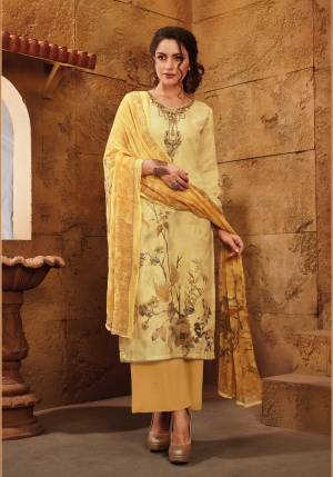 Go with The Shade Of Yellow This Season With This Straight Suit In Light Yellow Colored Top Paired With Occur Yellow Colored Bottom And Dupatta. Its Top And Bottom Are Fabricated On Satin Paired With Chiffon Dupatta. Buy This Suit Now.