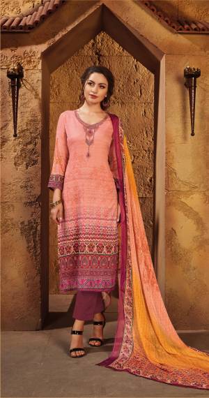 Shades Are Always And Gives Your Personality A Unique Look, Grab This Shaded Suit In Pink And Wine Color Paired With Wine Colored Bottom And Multi Colored Dupatta. Its Top And Bottom Are Fabricated On Satin Paired With Chiffon Dupatta. Buy This Suit Now.