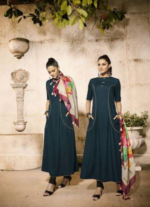 New And Unique Shade In Blue Is Here with This Designer Readymade Kurti In Prussian Blue Color Paired With Multi Colored Scarf. Its Kurti Is Fabricated On Rayon Paired With Cotton Fabricated Scarf. Both The Fabrics Are Soft Towards Skin And Easy To Carry All Day Long.