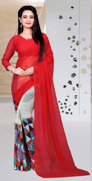 Adorn The Pretty Angelic Look Wearing This Saree In Red And Multi Color Paired With Red Colored Blouse. This Saree And Blouse Are Fabricated On Chiffon Beautified With Prints, Also It Is Light In Weight And Easy To Drape Which Is Easy To Carry All Day Long.