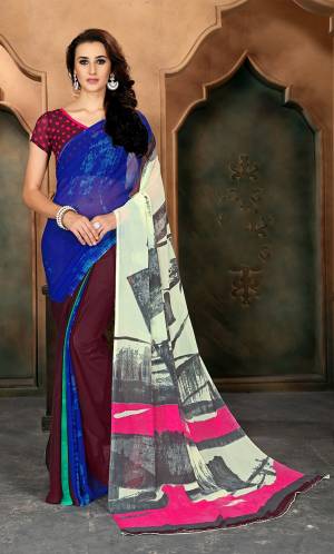 For Your Casual Wear, Grab This Pretty Saree In Blue And Wine Color Paired With Wine Colored Blouse. This Saree And blouse Are Fabricated On Chiffon. Its Fabrics Ensures Superb Comfort All Day Long As It Is Light In Weight.