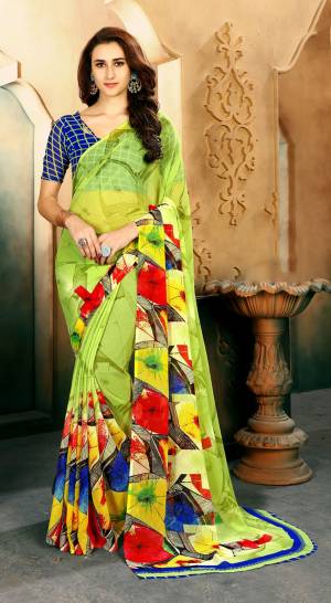 Look Attractive Wearing This Saree In Light Green Color Paired With Contrasting Royal Blue Colored Blouse. This Saree And Blouse Are Fabricated On Chiffon Beautified With Multi Colored Abstract Prints. Buy This Saree Now.