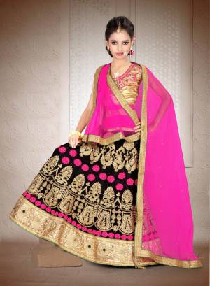 Bright And Visually Appealing Color Is Here As Per Kids. Grab This Designer Lehenga Choli In Golden Colored Blouse Paired With Black Colored Lehenga And Fuschia Pink Colored Dupatta. Its Blouse Is Fabricated On Art Silk Paired With Net Fabricated Lehenga And Dupatta. Buy This Lehenga Choli Now.