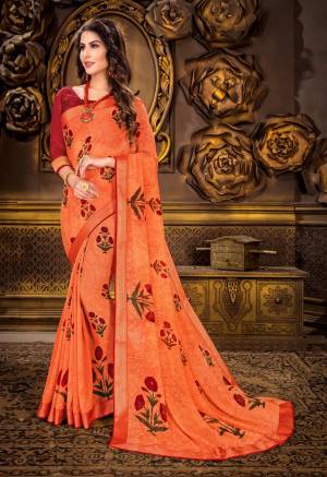 Orange And Color Induces Perfect Summery Appeal To Any Outfit, So Grab This Saree In Orange Color Paired With Contrasting Red Colored Blouse. This Saree Is Fabricated On Georgette Paired With Art Silk Fabricated Blouse. It Is Light In Weight And Easy To Carry All Day Long.