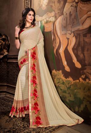 Flaunt Your Rich and Elegant Taste Wearing This Saree In Off-White Color Paired With Red Colored Blouse. This Saree Is Fabricated On Georgette Paired With Art Silk Fabricated Blouse. It Is Beautified With Floral Prints Over The Saree Border.
