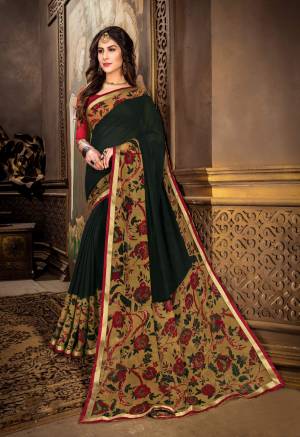 Dark Colors Gives A Very Pretty And Attractive Look To Your Personality, So Grab This Saree In Pine Green Color Paired With Contrasting Maroon Colored Blouse. This Saree Is Fabricated On Georgette Paired With Art Silk Fabricated Blouse. It Is Beautified With Contrasting Colored Floral Prints. 