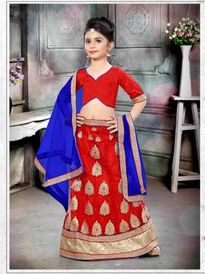 Shine Bright With this Attractive Colored Designer Lehenga Choli In Red Paired With Contrasting Royal Blue Colored Dupatta. Its Blouse Is Fabricated On Art Silk Paired With Net Fabricated Lehenga And Dupatta. 