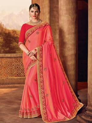 Presenting this red And Pink color two tone silk fabrics saree. Ideal for party, festive & social gatherings. this gorgeous saree featuring a beautiful mix of designs. Its attractive color and designer heavy embroidered design, Flower patch design, beautiful floral design work over the attire & contrast hemline adds to the look. Comes along with a contrast unstitched blouse.