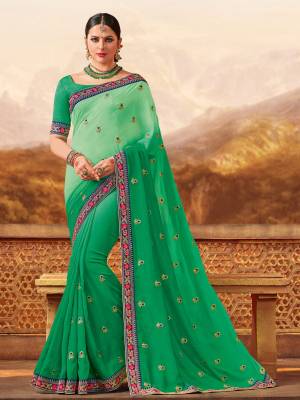 you Look striking and stunning after wearing this green color shaded silk fashions saree. look gorgeous at an upcoming any occasion wearing the saree. this party wear saree won't fail to impress everyone around you. Its attractive color and designer heavy embroidered design, Flower patch design, beautiful floral design work over the attire & contrast hemline adds to the look. Comes along with a contrast unstitched blouse.