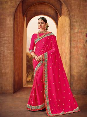 You can this amazing saree and look pretty like never before. wearing this Rani Pink color two tone silk fabrics saree. this gorgeous saree featuring a beautiful mix of designs. look gorgeous at an upcoming any occasion wearing the saree. Its attractive color and designer heavy embroidered design, Flower patch design, beautiful floral design work over the attire & contrast hemline adds to the look. Comes along with a contrast unstitched blouse.