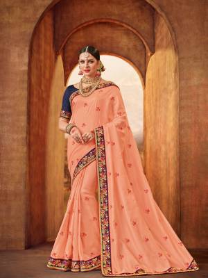 Flaunt a new ethnic look wearing this Pretty Peach color silk saree. Ideal for party, festive & social gatherings. this gorgeous saree featuring a beautiful mix of designs. Its attractive color and designer heavy embroidered design, Flower patch design, beautiful floral design work over the attire & contrast hemline adds to the look. Comes along with a contrast unstitched blouse.