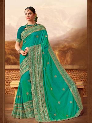Drape this Blue color two tone silk fabrics saree. this gorgeous saree featuring a beautiful mix of designs. look gorgeous at an upcoming any occasion wearing the saree. Its attractive color and designer heavy embroidered design, Flower patch design, beautiful floral design work over the attire & contrast hemline adds to the look. Comes along with a contrast unstitched blouse.
